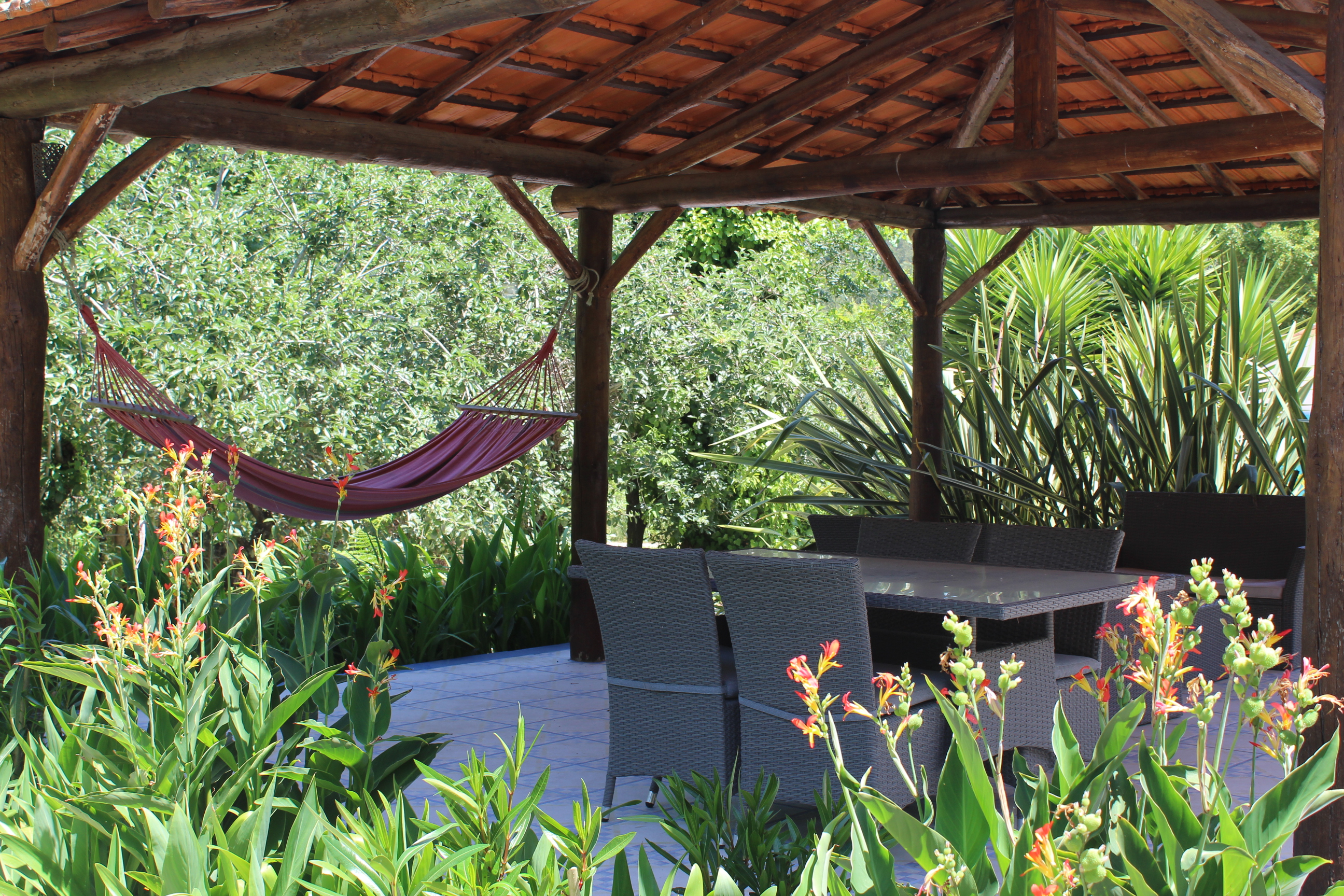 Gazebo with exterior dinning table